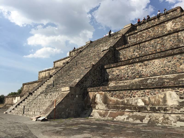 climbing up the temple of the moon at teotihuacan
